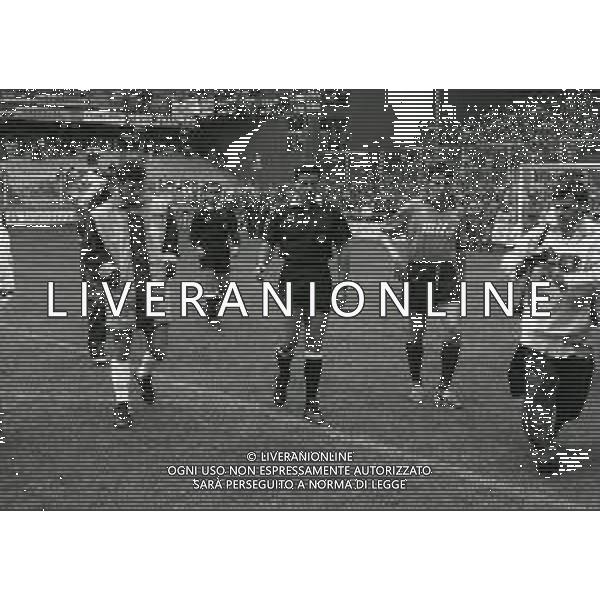 07-10-1990 GENOVA -CAMPIONATO DI CALCIO SERIE A GENOA-NAPOLI 1-1 NELLA FOTO I DUE CAPITANI CIRO FERRARA E STEFANO ERANIO CON L\'ARBITRO ROSARIO LO BELLO CONTROLLANO IL CAMPO DOPO LA PIOGGIA AG ALDO LIVERANI SAS 