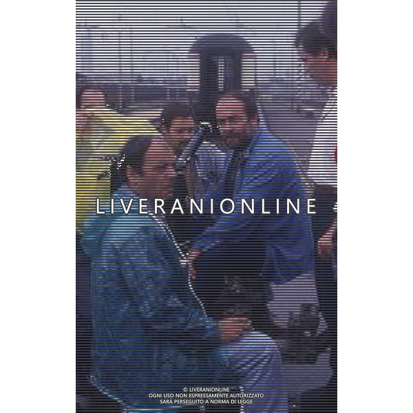 RETROSPETTIVA GIUSEPPE BERTOLUCCI REGISTA NELLA FOTO GIUSEPPE BERTOLUCCI SUL SET DEL FILM “I CAMMELLI“ NELL\'ANNO 1988 AG ALDO LIVERANI SAS 
