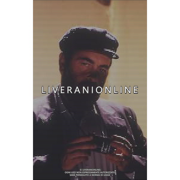RETROSPETTIVA GIUSEPPE BERTOLUCCI REGISTA NELLA FOTO GIUSEPPE BERTOLUCCI SUL SET DEL FILM “I CAMMELLI“ NELL\'ANNO 1988 AG ALDO LIVERANI SAS 