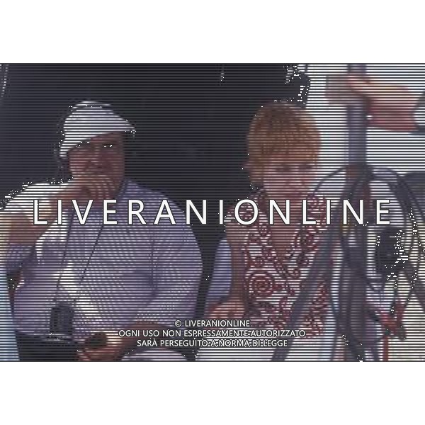 RETROSPETTIVA GIUSEPPE BERTOLUCCI REGISTA NELLA FOTO GIUSEPPE BERTOLUCCI SUL SET DEL FILM “I CAMMELLI“ NELL\'ANNO 1988 AG ALDO LIVERANI SAS 