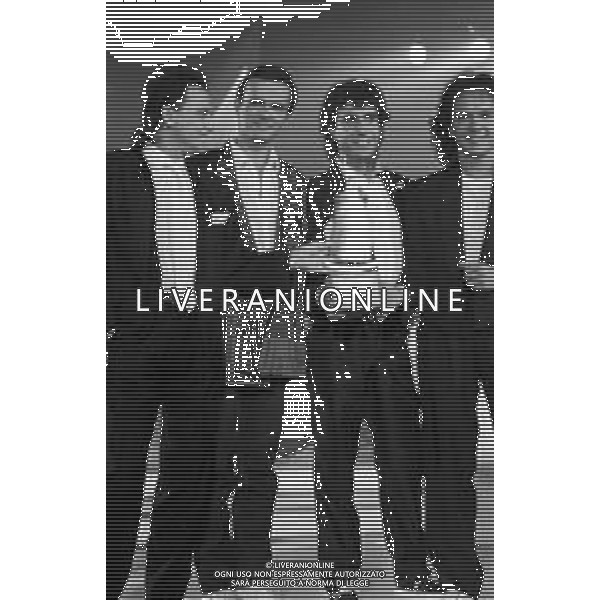 RETROSPETTIVA DEL GRUPPO MUSICALE \'I POOH\' VINCITORI DELLA VELA A RIVA DEL GARDA NEL 1986 NELLA FOTO DODI BATTAGLIA, ROBY FACCHINETTI, STEFANO D\'ORAZIO, RED CANZIAN AG ALDO LIVERANI SAS
