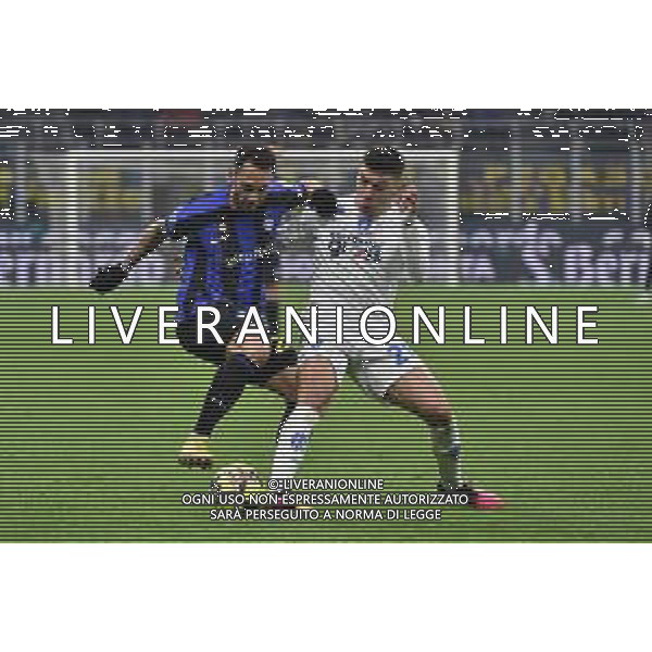 Hakan Calhanoglu (Inter) e Nicolo\' Cambiaghi (Empoli) Inter vs Empoli Milano 23-01-2023 Stadio Giuseppe Meazza - San Siro Campionato Serie A TIM - 19a giornata foto Roberto Garavaglia/ag. Aldo Liverani sas / AGENZIA ALDO LIVERANI SAS   