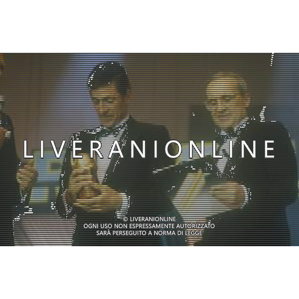 RETROSPETTIVA DAN PETERSON ALLENATORE BASKET NELLA FOTO DAN PETERSON ALLENATORE NELL\'ANNO 1987 A MILANO ALLA PREMIAZIONE DELL\'AOSCAR DELLO SPORT CON FRANCESCO MOSER AG ALDO LIVERANI SAS  