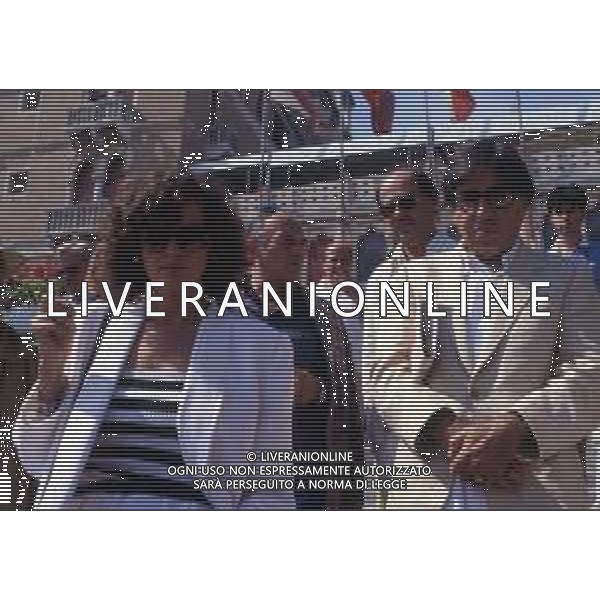 ARCHIVIO GIOVANNI LIVERANI RETROSPETTIVA CLAUDIA CARDINALE ATTRICE NELLA FOTO A VENEZIA NEL 1984 CON IL MARITO PASQUALE SQUITIERI AG ALDO LIVERANI SAS