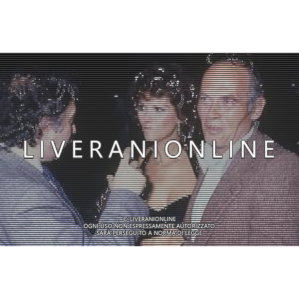 RETROSPETTIVA CLAUDIA CARDINALE ATTRICE NELLA FOTO CON IL MARITO PASQUALE SQUITIERI E GIANNI MINA\' OSPITE DELLA TRASMISSIONE BLITZ - MILANO ANNI \'80 AG ALDO LIVERANI SAS