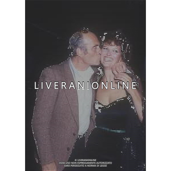 RETROSPETTIVA CLAUDIA CARDINALE ATTRICE NELLA FOTO CON IL MARITO PASQUALE SQUITIERI OSPITE DELLA TRASMISSIONE BLITZ - MILANO ANNI \'80 AG ALDO LIVERANI SAS