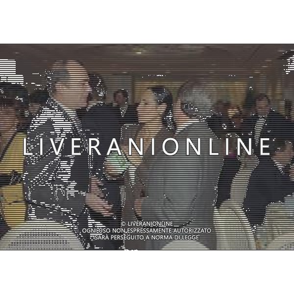 RETROSPETTIVA CANDIDO CANNAVO\' GIORNALISTA SCRITTORE E DIRETTORE DELLA GAZZETTA DELLO SPORT NELLA FOTO CANDIDO CANNAVO\' CON LA MOGLIE ED ERNESTO PELLEGRINI AL PREMIO MEAZZA IL GIORNO 10-12-1991 AG ALDO LIVERANI SAS
