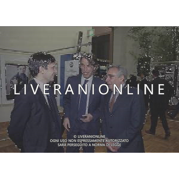 RETROSPETTIVA CANDIDO CANNAVO\' GIORNALISTA SCRITTORE E DIRETTORE DELLA GAZZETTA DELLO SPORT NELLA FOTO CANDIDO CANNAVO\' A MILANO PRESENZIA ALLA MOSTRA BENEFICA INTER POLAROID IL 23-03-2000 CON MASIMO MORATTI E FRANCO BONERA AG ALDO LIVERANI SAS  