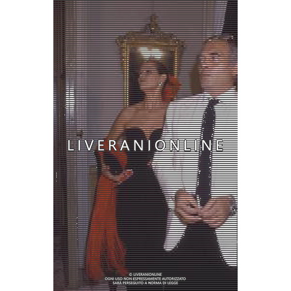 ARCHIVIO ALDO LIVERANI NELLA FOTO CLAUDIA CARDINALE-PASQUALE SQUITTIERI AG ALDO LIVERANIARCHIVIO GIOVANNI LIVERANI RETROSPETTIVA CLAUDIA CARDINALE ATTRICE Nella foto ALLA FESTA DELLA MODA NEL 1987 CON IL MARITO PASQUALE SQUITIERI AG ALDO LIVERANI SAS