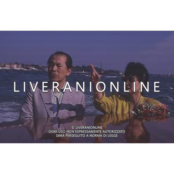 RETROSPETTIVA TOSHIRO MIFUNE REGISTA NELLA FOTO TOSHIRO MIFUNE A VENEZIA NELL\'ANNO 1989 CON LA FAMIGLIA AG ALDO LIVERANI SAS 