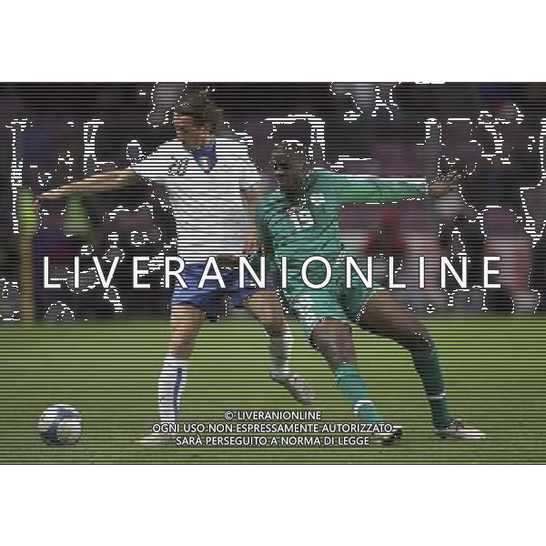 Ginevra 16/11/2005 Italia - Costa d\'Avorio amichevole nazionale nella foto stefano aimo diana e yaya toure ph luzzani/agenzia aldo liverani