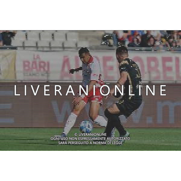 Waild Cheddira (SSC Bari) and Gaetano Letizia (Benevento Calcio) during the Italian soccer Serie B match SSC Bari vs Benevento Calcio on April 1, 2023 at the San Nicola stadium in Bari, Italy. Photo by Emmanuele Mastrodonato/ag. Aldo Liverani sas / AGENZIA ALDO LIVERANI SAS