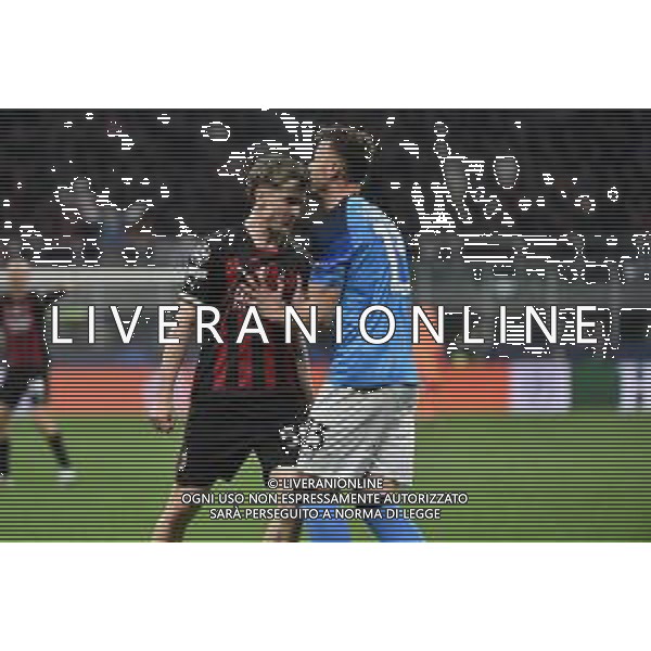 tensione tra Alexis Saelemaekers (Milan) e Amir Rrahmani (Napoli) Milan vs Napoli Milano 12-04-2023 Stadio Giuseppe Meazza - San Siro UEFA Champions League quarti di finale - gara di andata foto Roberto Garavaglia/ag. Aldo Liverani sas/ AGENZIA ALDO LIVERANI SAS