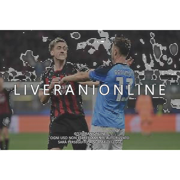 tensione tra Alexis Saelemaekers (Milan) e Amir Rrahmani (Napoli) Milan vs Napoli Milano 12-04-2023 Stadio Giuseppe Meazza - San Siro UEFA Champions League quarti di finale - gara di andata foto Roberto Garavaglia/ag. Aldo Liverani sas/ AGENZIA ALDO LIVERANI SAS