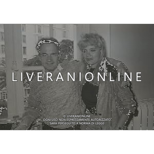 RETROSPETTIVA GIORGIO MORODER PRODUTTORE DISCOGRAFICO-COMPOSITORE E DISK JOCKEY NELLA FOTO GIRGIO MORODER CON ELENA ST JOHN A CANNES NELL\'ANNO 1984 AG ALDO LIVERANI SAS