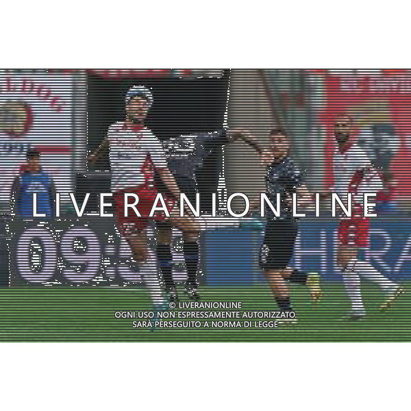 Raffaele Pucino (SSC Bari) and Patrick Cutrone (Como 1907) during the Serie B match between SSC Bari and Como 1907 at Stadio San Nicola on April 15, 2023 in Bari, Italy. Photo by Emmanuele Mastrodonato/ag. Aldo Liverani sas