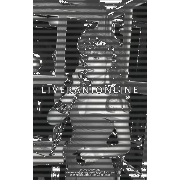 RETROSPETTIVA TINI CANSINO PSEUDONIMO DI PHOTINA LAPPA SHOWGIRL-ATTRICE E OPINIONISTA GRECA NELLA FOTO TINI CANSINO PSEUDONIMO DI PHOTINA LAPPA NELL\'ANNO 1985 ALLA DISCOTECA BANDIERA GIALLA DI RIMINI AG ALDO LIVERANI SAS