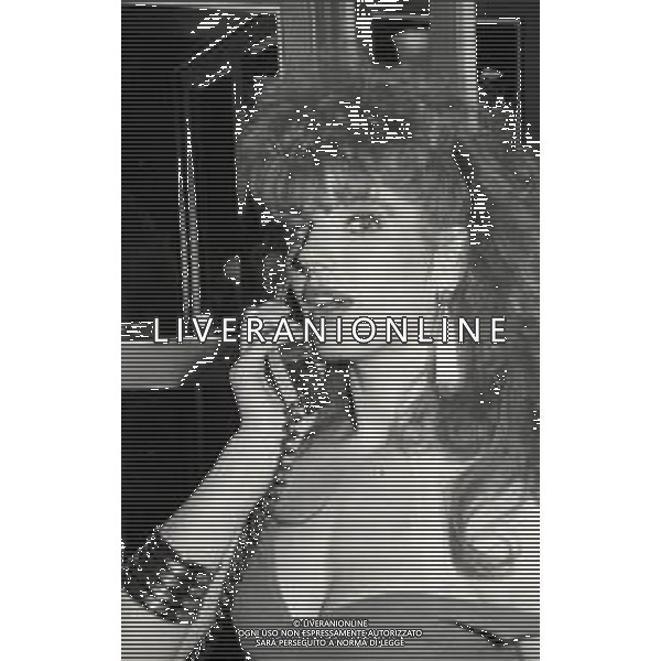 RETROSPETTIVA TINI CANSINO PSEUDONIMO DI PHOTINA LAPPA SHOWGIRL-ATTRICE E OPINIONISTA GRECA NELLA FOTO TINI CANSINO PSEUDONIMO DI PHOTINA LAPPA NELL\'ANNO 1985 ALLA DISCOTECA BANDIERA GIALLA DI RIMINI AG ALDO LIVERANI SAS