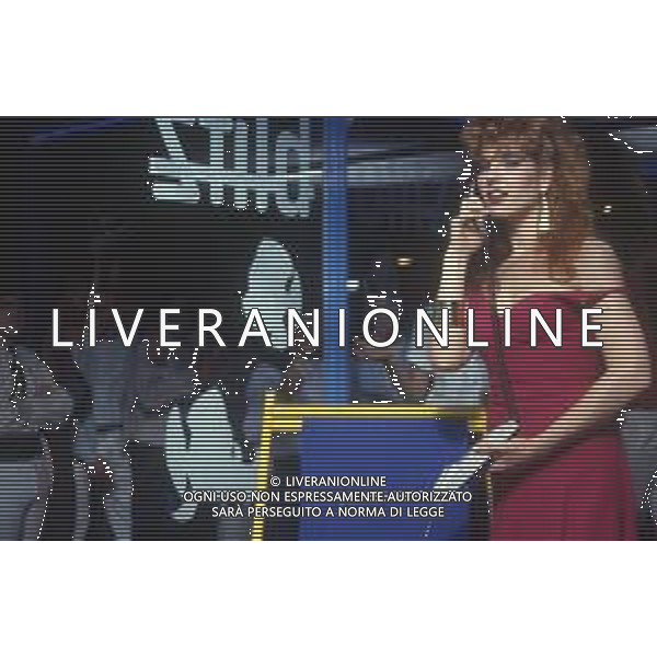 RETROSPETTIVA TINI CANSINO PSEUDONIMO DI PHOTINA LAPPA SHOWGIRL-ATTRICE E OPINIONISTA GRECA NELLA FOTO TINI CANSINO PSEUDONIMO DI PHOTINA LAPPA NELL\'ANNO 1985 ALLA DISCOTECA BANDIERA GIALLA DI RIMINI AG ALDO LIVERANI SAS