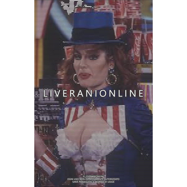 RETROSPETTIVA TINI CANSINO PSEUDONIMO DI PHOTINA LAPPA SHOWGIRL-ATTRICE E OPINIONISTA GRECA NELLA FOTO TINI CANSINO PSEUDONIMO DI PHOTINA LAPPA NELLA TRASMISSIONE TELEVISIVA“DRIVE IN“ AG ALDO LIVERANI SAS 
