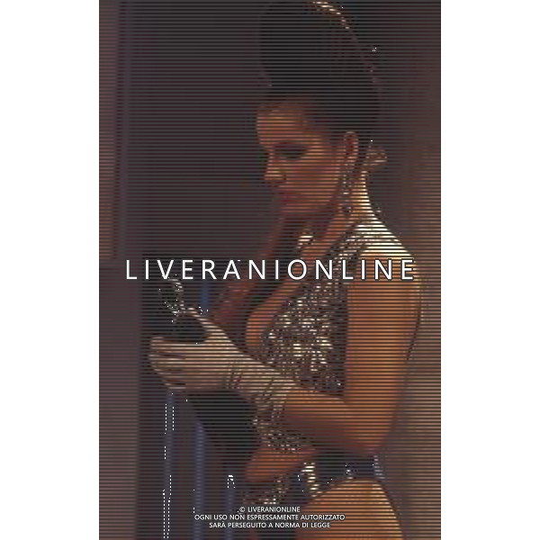 RETROSPETTIVA TINI CANSINO PSEUDONIMO DI PHOTINA LAPPA SHOWGIRL-ATTRICE E OPINIONISTA GRECA NELLA FOTO TINI CANSINO PSEUDONIMO DI PHOTINA LAPPA NELLA TRASMISSIONE TELEVISIVA“DRIVE IN“ AG ALDO LIVERANI SAS  