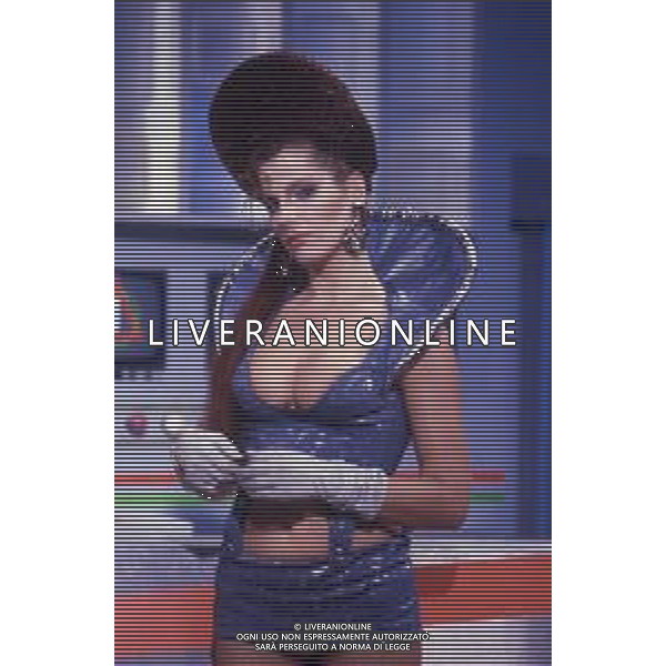 RETROSPETTIVA TINI CANSINO PSEUDONIMO DI PHOTINA LAPPA SHOWGIRL-ATTRICE E OPINIONISTA GRECA NELLA FOTO TINI CANSINO PSEUDONIMO DI PHOTINA LAPPA NELLA TRASMISSIONE TELEVISIVA“DRIVE IN“ AG ALDO LIVERANI SAS 