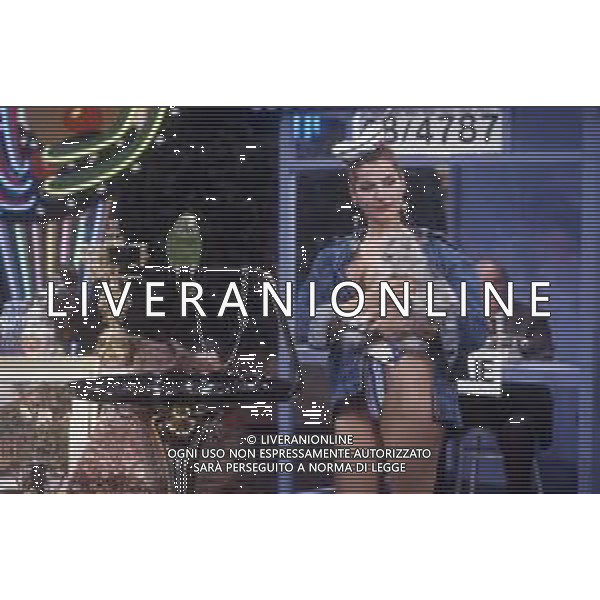 RETROSPETTIVA TINI CANSINO PSEUDONIMO DI PHOTINA LAPPA SHOWGIRL-ATTRICE E OPINIONISTA GRECA NELLA FOTO TINI CANSINO PSEUDONIMO DI PHOTINA LAPPA NELLA TRASMISSIONE TELEVISIVA“DRIVE IN“ AG ALDO LIVERANI SAS 