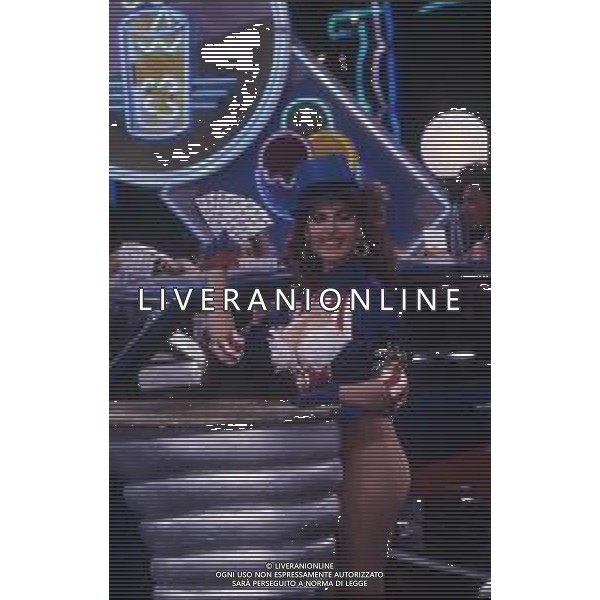 RETROSPETTIVA TINI CANSINO PSEUDONIMO DI PHOTINA LAPPA SHOWGIRL-ATTRICE E OPINIONISTA GRECA NELLA FOTO TINI CANSINO PSEUDONIMO DI PHOTINA LAPPA NELLA TRASMISSIONE TELEVISIVA“DRIVE IN“ AG ALDO LIVERANI SAS  