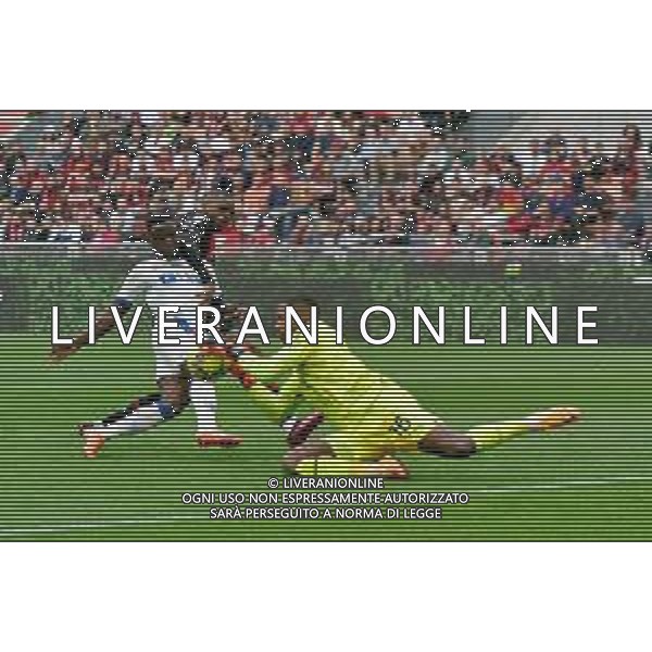 Federico Di Francesco (US Lecce) and Lameck Banda (US Lecce) Mike Maignan (AC Milan) during the Italian soccer Serie A match AC Milan vs US Lecce on April 23, 2023 at Giuseppe Meazza Stadium in Milan, Italy. Photo by Emmanuele Mastrodonato/ag. Aldo Liverani sas/ AGENZIA ALDO LIVERANI SAS