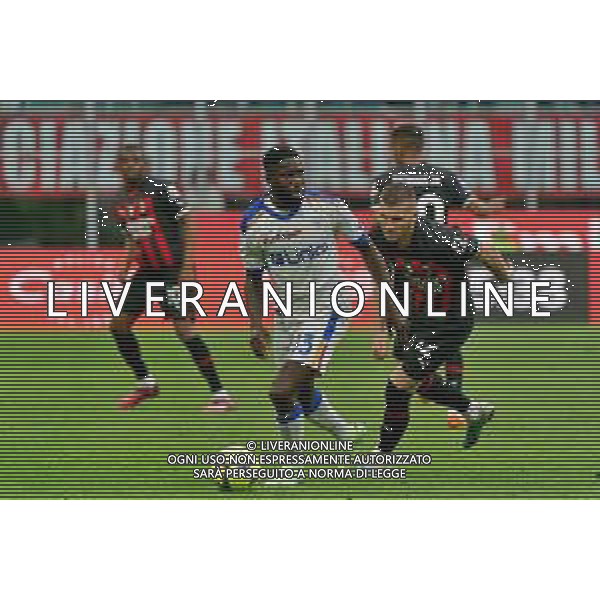 Samuel Umtiti (US Lecce) and Ante Rebic (AC Milan) during the Italian soccer Serie A match AC Milan vs US Lecce on April 23, 2023 at Giuseppe Meazza Stadium in Milan, Italy. Photo by Emmanuele Mastrodonato/ag. Aldo Liverani sas/ AGENZIA ALDO LIVERANI SAS