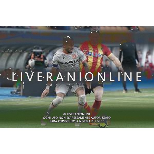 Roberto Pereyra (Udinese Calcio) and Federico Baschirotto (US Lecce) during the Italian soccer Serie A match US Lecce vs Udinese Calcio on April 28, 2023 at Via del Mare Stadium in Lecce, Italy. Photo by Emmanuele Mastrodonato/ag. Aldo Liverani sas/ AGENZIA ALDO LIVERANI SAS