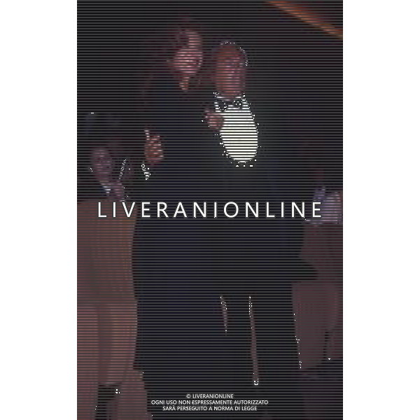 RETROSPETTIVA GIORGIO ARMANI STILISTA NELLA FOTO GIORGIO ARMANI NELL\'ANNO 1990 A VENEZIA CON MILVA AG ALDO LIVERANI SAS  
