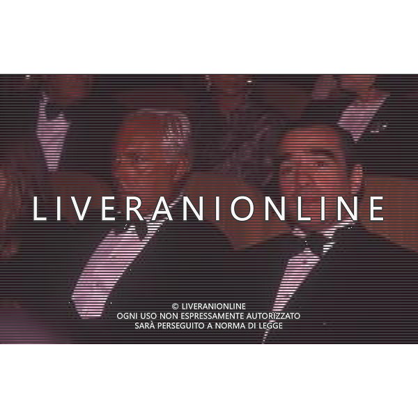 RETROSPETTIVA GIORGIO ARMANI STILISTA NELLA FOTO GIORGIO ARMANI NELL\'ANNO 1990 A VENEZIA CON MARTIN SCORZESE AG ALDO LIVERANI SAS  