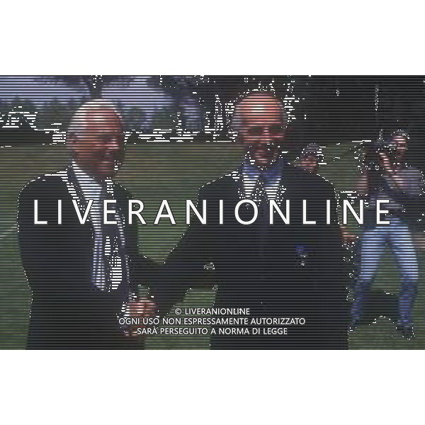 RETROSPETTIVA GIORGIO ARMANI STILISTA NELLA FOTO GIORGIO ARMANI CON ARRIGO SACCHI NELL\'ANNO 1994 A MILANELLO AG ALDO LIVERANI SAS  