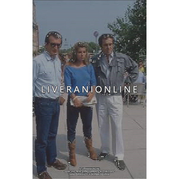RETROSPETTIVA BERNARDO BERTOLUCCI REGISTA NELLA FOTO A VENEZIA NEL 1982 CON LUCIANO MANUZZI E LORELLA MORLOTTI (CAST DEL FILM \'SCONCERTO ROCK\') AG ALDO LIVERANI SAS