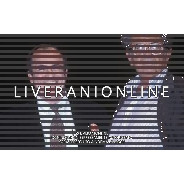 RETROSPETTIVA BERNARDO BERTOLUCCI REGISTA NELLA FOTO NELL\'ANNO 1990 CON NANNI LOI AG ALDO LIVERANI SAS
