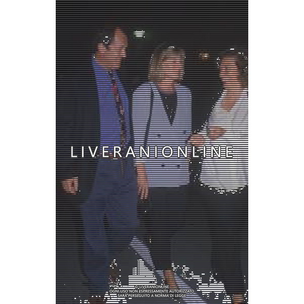 RETROSPETTIVA BERNARDO BERTOLUCCI REGISTA NELLA FOTO CON LA MOGLIE CLARE PEPLOE NELL\'ANNO 1990 AG ALDO LIVERANI SAS