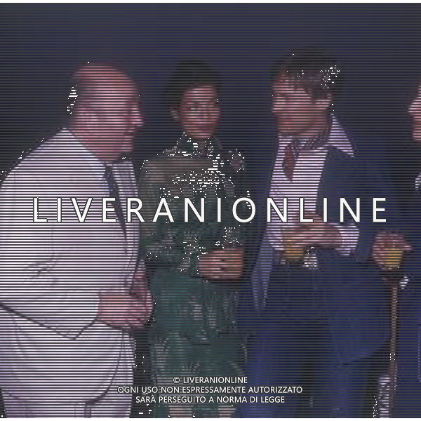 DIAP-RETROSPETTIVA HELMUT BERGER ATTORE NELLA FOTO HELMUT BERGER CON BIANCA JAGGER CANNES IL 1-05-1975 AG ALDO LIVERANI SAS  