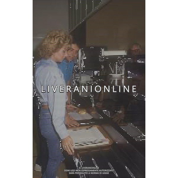 DIAP-RETROSPETTIVA ENRICA BONACCORTI ATTRICE E CONDUTTRICE TELEVISIVA NELLA FOTO ENRICA BONACCORTI CON ARNALDO DEL PèIAVE A ROMA NELL\'ANNO 1986 FOTO EDGARDO DELLA SCORCIOSA-AG ALDO LIVERANI SAS   