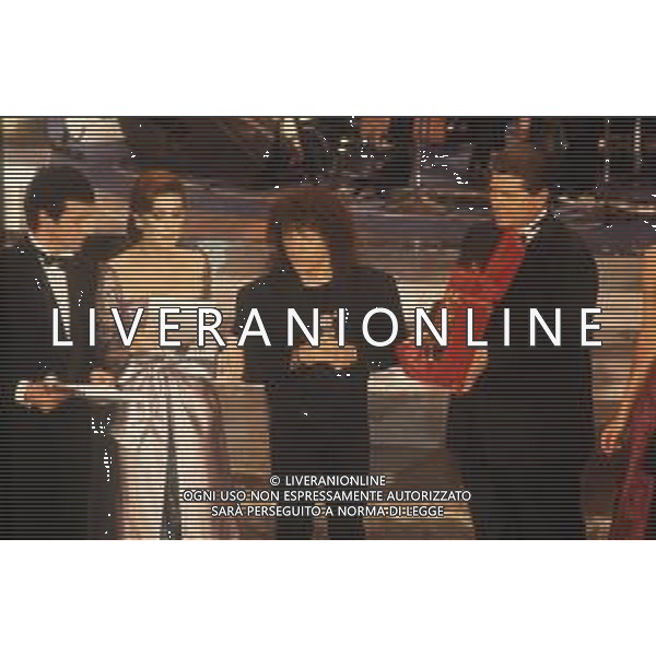 DIAP-RETROSPETTIVA EDWIGE FENECH ATTRICE NELLA FOTO EDWIGE FENECH NELL\'ANNO 1991 AL FESTIVAL DI SANREMO CON RICCARDO COCCIANTE VINCITORE AG ALDO LIVERANI SAS 