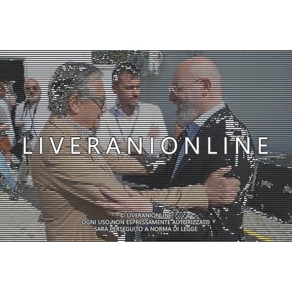IMOLA 29 07 2023 AUTODROMO ENZO E DINO FERRAR I "IMOLA SUMMER FESTIVAL" CONCERTO DI BENIFICENZA PER GLI ALLUVIONATI IN ROMAGNA NELLA FOTO GIANCARLO MINARDI PRESIDENTE DELL\'AUTODROMO ENZO E DINO FERRARI E STEFANO BONACCINI PRESIDENTE DELLA REGIONE EMILIA ROMAGNA IN CENTRO SINDACO DI IMOLA MARCO PANIERI FOTO GIANNI SANNA-AG ALDO LIVERANI SAS