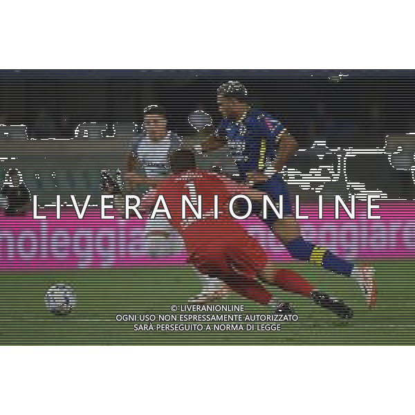 TVRG Hellas Verona vs Ascoli nella foto Jordi Mboula (Hellas Verona) salta Davide Barosi (Ascoli) e segna il gol dell\'1 a 0 Verona 12-08-2023 Stadio Marcantonio Bentegodi Coppa Italia Frecciarossa - 32mi di finale foto Roberto Garavaglia/ag. Aldo Liverani sas