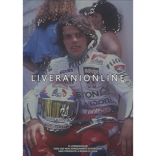 RETROSPETTIVA LORIS CAPIROSSI PILOTA MOTO NELLA FOTO LORIS CAPIROSSI NELL\'ANNO 1990 CAMPIONE DEL MONDO CC 125 FOTO CONTROLUCE-AG ALDO LIVERANI SAS