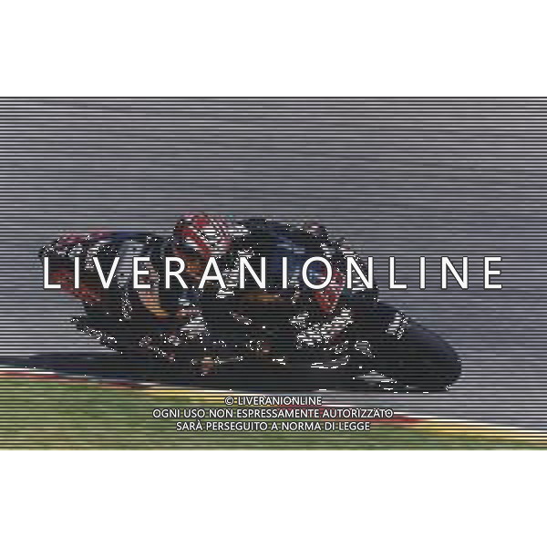 RETROSPETTIVA LORIS CAPIROSSI PILOTA MOTO NELLA FOTO LORIS CAPIROSSI NELL\'ANNO 2002 AG CONTROLUCE-AG ALDO LIVERANI SAS   