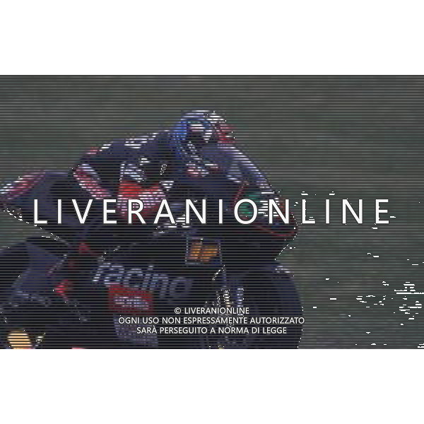 RETROSPETTIVA LORIS CAPIROSSI PILOTA MOTO NELLA FOTO LORIS CAPIROSSI NELL\'ANNO 1997 AG CONTROLUCE-AG ALDO LIVERANI SAS  