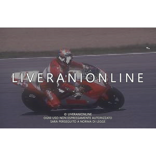 RETROSPETTIVA LORIS CAPIROSSI PILOTA MOTO NELLA FOTO LORIS CAPIROSSI NELL\'ANNO 1996 AG CONTROLUCE-AG ALDO LIVERANI SAS 