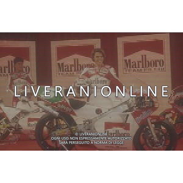 RETROSPETTIVA LORIS CAPIROSSI PILOTA MOTO NELLA FOTO LORIS CAPIROSSI NELL\'ANNO 1995 AG CONTROLUCE-AG ALDO LIVERANI SAS 