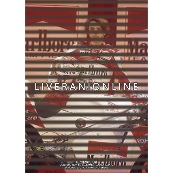 RETROSPETTIVA LORIS CAPIROSSI PILOTA MOTO NELLA FOTO LORIS CAPIROSSI NELL\'ANNO 1995 AG CONTROLUCE-AG ALDO LIVERANI SAS 