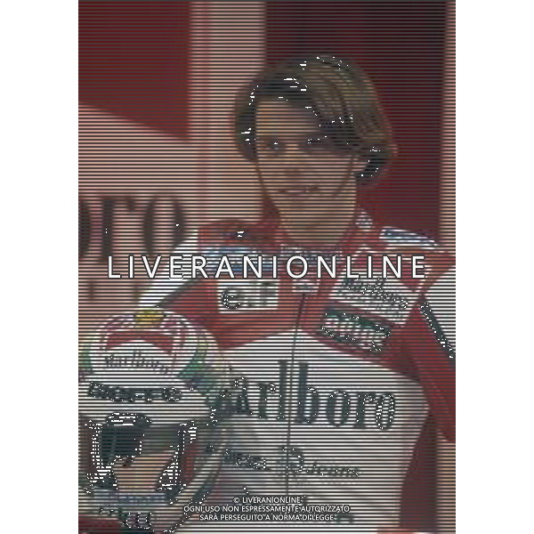 RETROSPETTIVA LORIS CAPIROSSI PILOTA MOTO NELLA FOTO LORIS CAPIROSSI NELL\'ANNO 1995 AG CONTROLUCE-AG ALDO LIVERANI SAS 