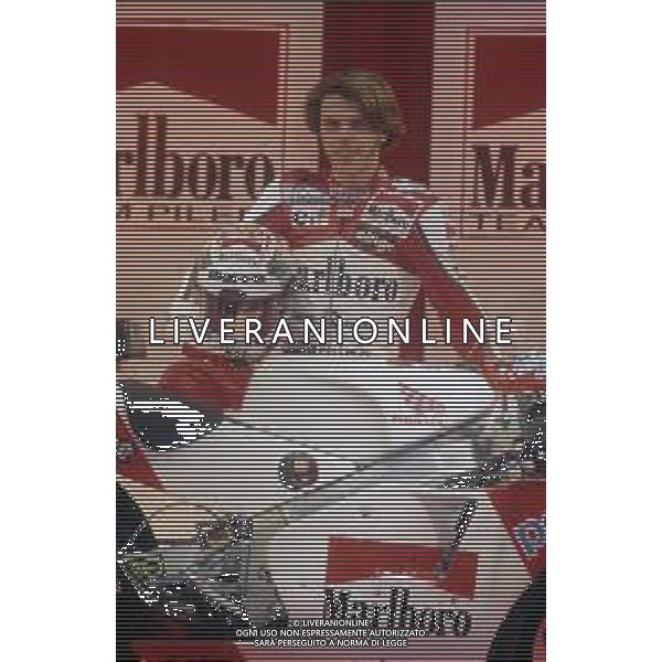 RETROSPETTIVA LORIS CAPIROSSI PILOTA MOTO NELLA FOTO LORIS CAPIROSSI NELL\'ANNO 1995 AG CONTROLUCE-AG ALDO LIVERANI SAS 